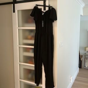 New, black, one piece jumpsuit